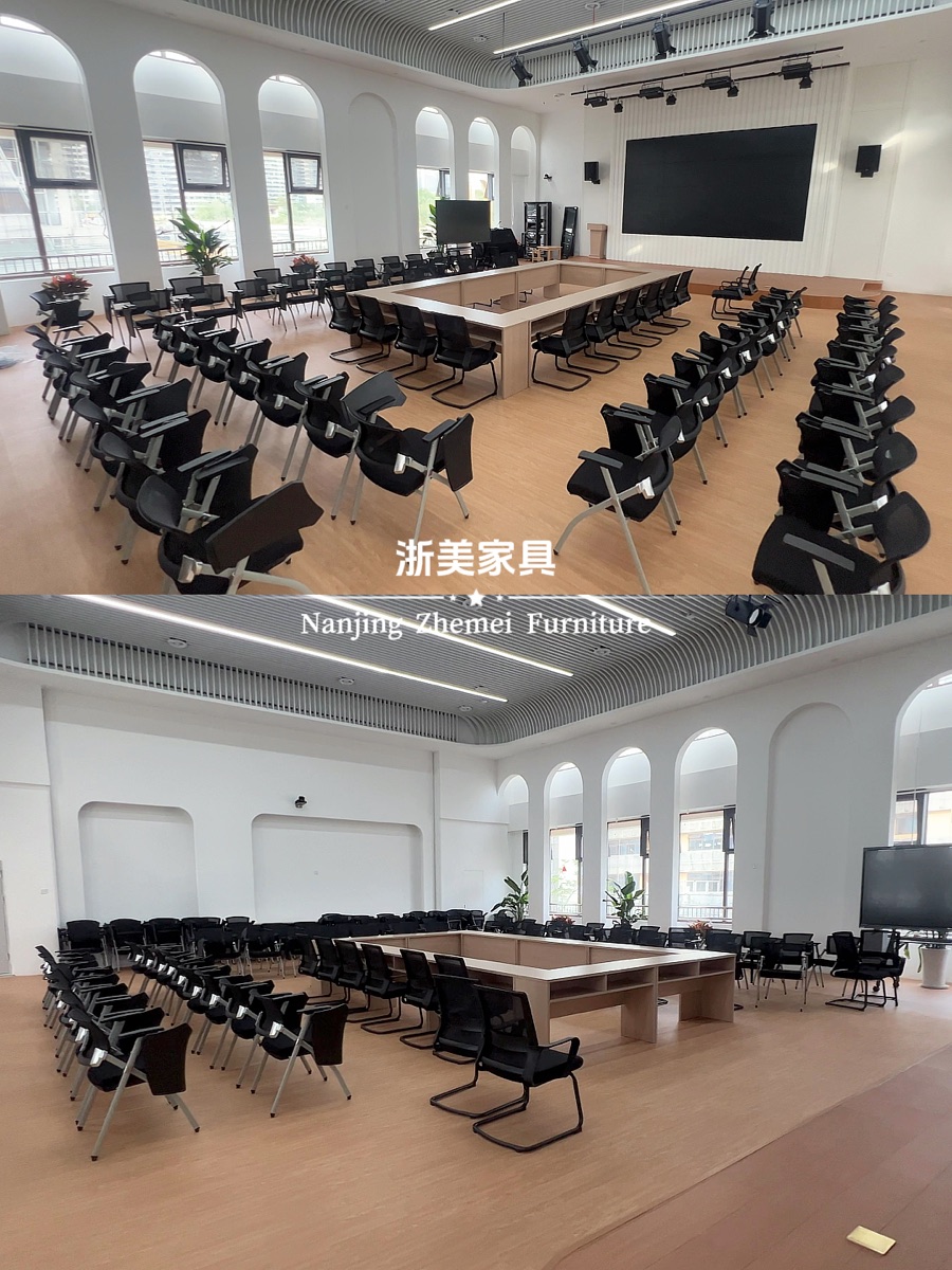 报告厅:座椅阵列与前方会议桌区